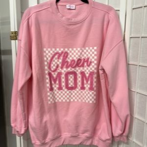 Pink Lily small pink oversized sweatshirt.  Cheer Mom logo. Good condition